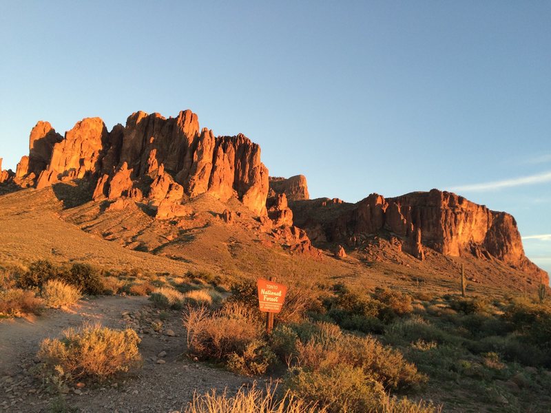 The cliff in the distance on the skyline above the sign: 3 miles and 3000 ft of elevation gain. Yeah!