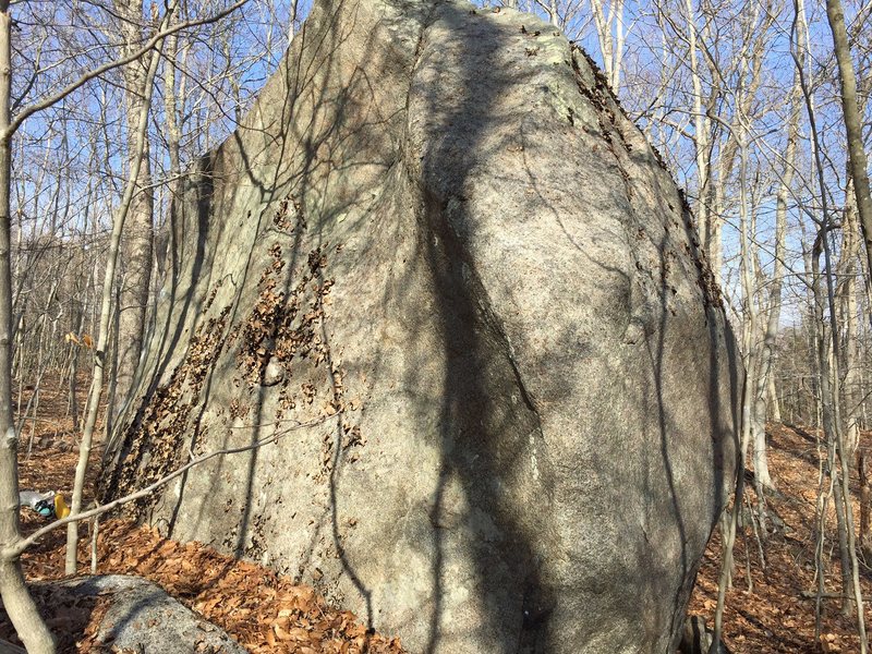 Water Technique, V5, climbs the arete in the foreground. It's tricky to see in the pic, but the arete is quite prominent and overhangs the face. 