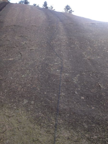 A rope hanging on the route.