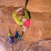 The incredible tight-hands splitter roof on the beginning on pitch two. Photo by Blake McCord, blakemccordphoto.com