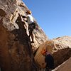 Belay station for Gandy (5.9) is kind of over this small chasm so we had our belayer anchor into the first bolt. 