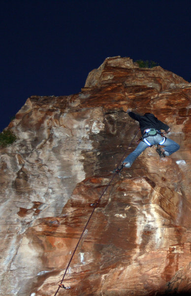 Climbing Elkes Puder by headlamp at night.