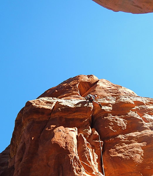 Nate, just past the crux (fingers in the back of an OW)