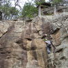 Chalking up before the crux on a nice ledge