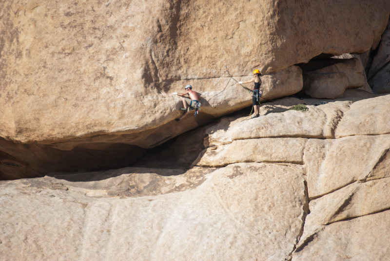 Two unknown climbers on the brutally hard start.