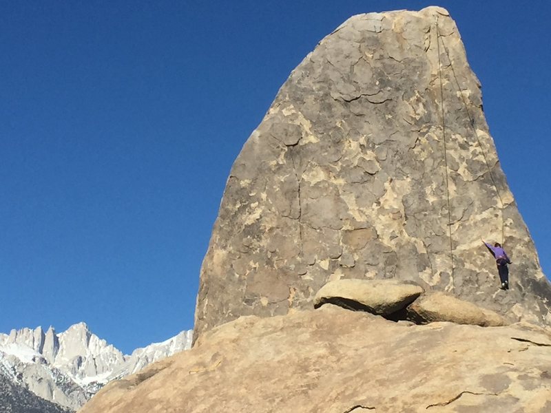 My daughter Marissa Whitney climbing under the much bigger Whitney!