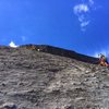 Andrea leading the 9 section of the traverse. Taken from belay on Till Broad Daylight.