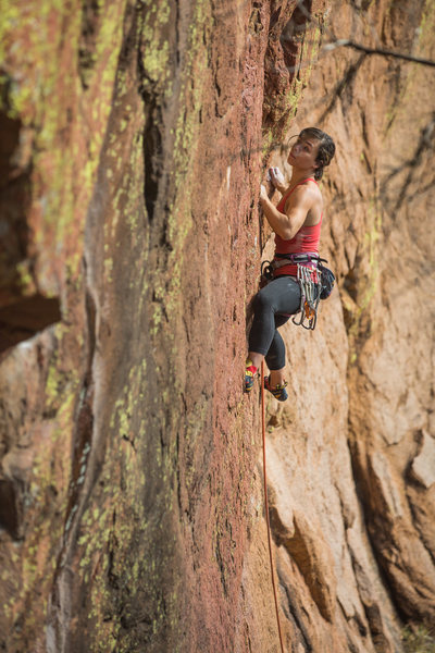 The first bolt is up there, be careful. Photography by Andrew Burr, Climber is Elisha Gallegos 