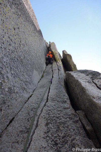 Marc on the nice crack in the chimney's pitches - Half Dome NW Regular