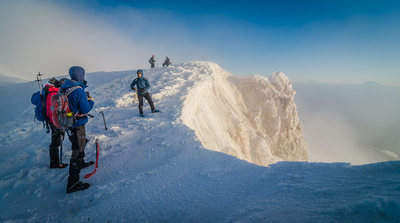 Celebrating at the summit rim.