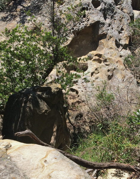 Hueco slab marks the start of the trail.