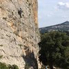 Climbing toprope in the vicinity of Cala Gorone, Sardinia, Italy.