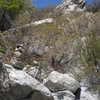 Though schwacky, the approach is marked by cairns along the way and has tunnels of access through the scrub oak