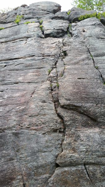 A crack with good hand and foot holds at the upper tier of the Wolf Rock. Beta: Not sure if it is "Star Fire" or "Tiger Kitty".