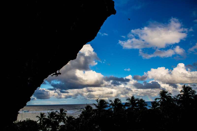 Cody Roth climbing "Me Gustaria Verte Otra Vez" (5.12d) at Fronton Beach climbing area.