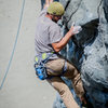 Zacharia climbing on the dihedral to the right of the Standard Route start.