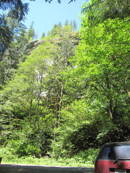 View of the crag from the parking pull-out. The trail to the Big Daddy section starts here.