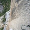 Looking down pitch 5 at the reachy bolt ladder. That's one blank steep face! 