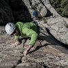 Josh Alford laughing his way up the left 5.7 crack just below the Summit Dome. This crack and the fun 5.7 crack just to the right are fun extensions to the Nose.