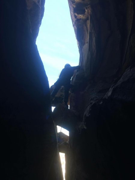 Moving belay to top of chockstone for p3