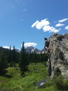 Quiet bouldering in a beautiful meadow abounds a mile west of the alpenglow boulder in the Indian Peaks Wilderness.