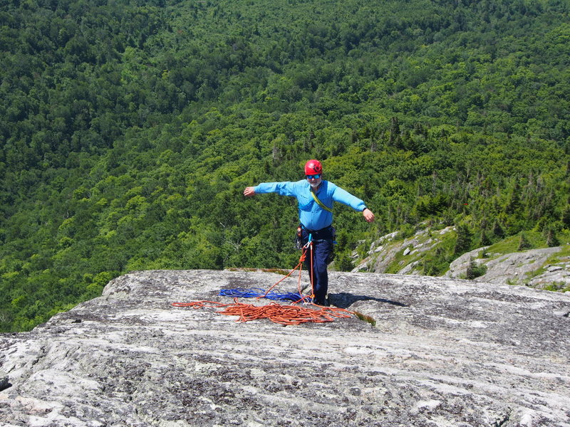 Ralph finds the 2-bolt anchor. We both walked down to it. (about 100-120 ft down)