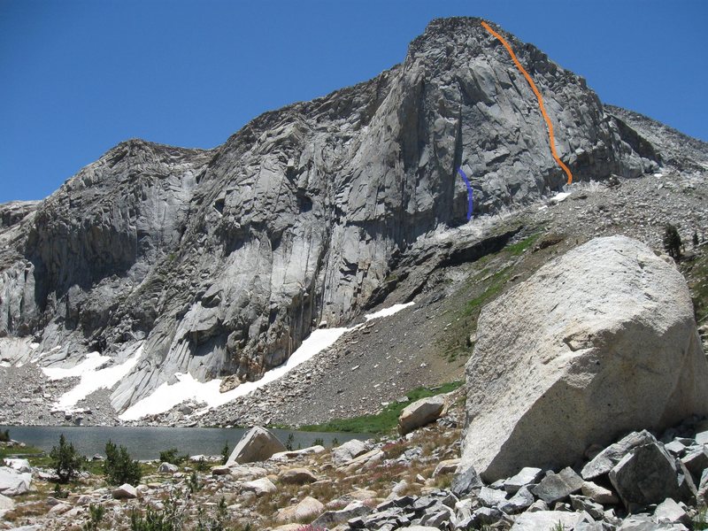 The best guess is that the Clevenger-Rowell route ascends the orange line. This route looks easy enough and clean enough that Rowell and Clevenger could think they could start at 2pm and reach the top before dark.<br>
<br>
At least two parties have tried the blue line, thinking they were repeating That's a Sheer Cliff. In both instances, the parties bailed after three 5.9 pitches due to the heavily vegetated right-facing corner above.