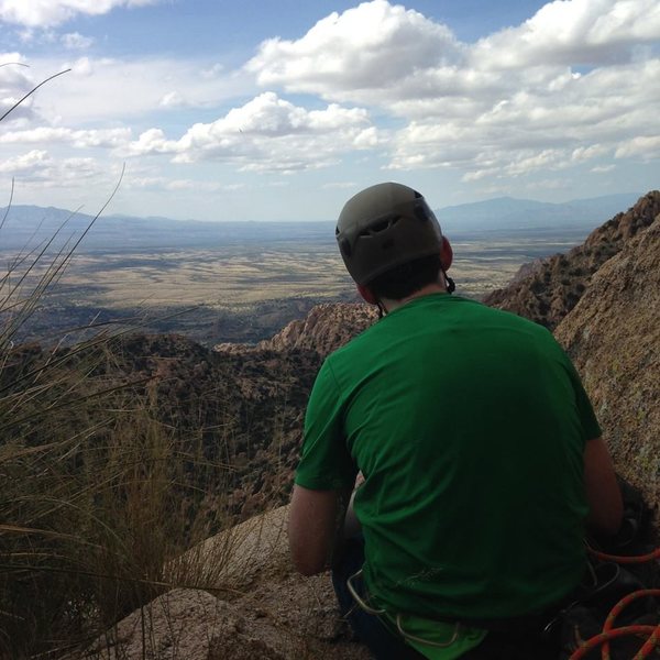 Admiring the view from the ledge at the top of pitch 4 on Ewephoria. 