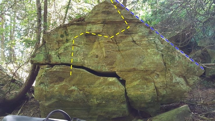 Picture of Pharaohs Peak(yellow) and Jenn Queen of the Nile (blue) route on Raiders Of The Lost Ark Boulder