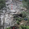 Cool Colorado Rain in red, with the 1st 3 bolts marked.<br>
(Tim is rappelling Rolling in Your Arms.)