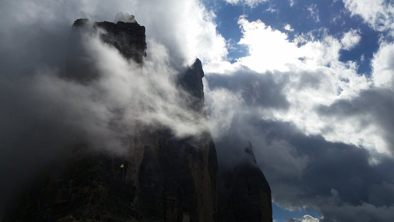 With a slightly better forecast, we managed to climb the famous Spigolo Giallo "Yellow Edge" at Tre Cime. A very nice 13 pitch route.  This is a view of the whole group in the clouds from the pass - on my hike down from our climb.