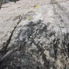 1st 2 bolts marked.<br>
<br>
Rope on Hard Monkey to the left; <br>
Water Groove obvious to the right.