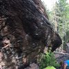 The line. Sit start on opposing sidepulls with butt on the small rock, then go up using the only features there are.