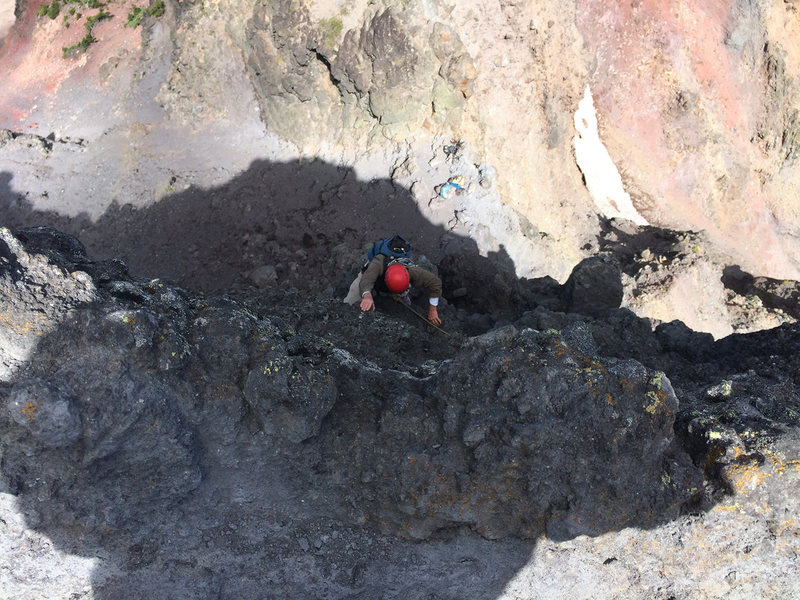 Following the first technical pitch on the summit pillar of Mt. Washington (one move of 5.1).  The packs can be seen below at the saddle, the end of the long hike/scramble up the north ridge.