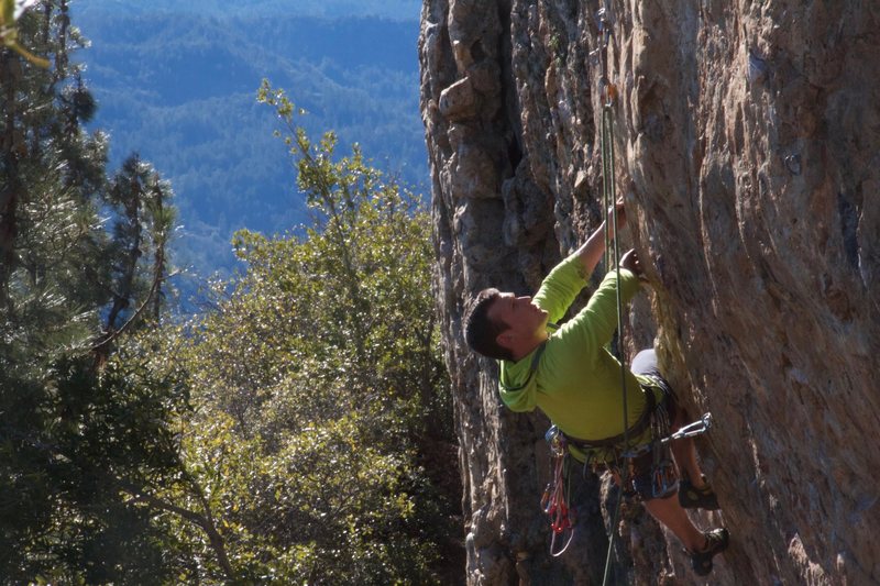 Unknown climber from Colorado working out the moves.