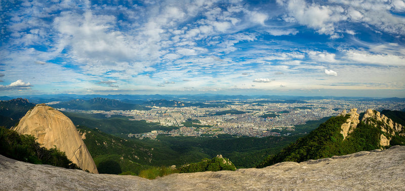 Insubong (upper pitches) on the left of the pano above Seoul.