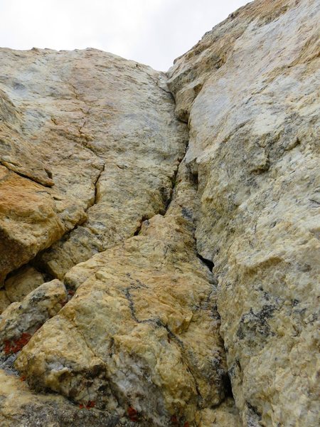 Looking up at the direct 5.9 corner of Pitch 5. This is quite steep at the top. This is the way we went, although going around left would have been easier.