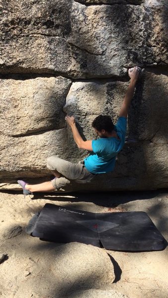 Bert with some fancy footwork after hitting the solid hand hold.