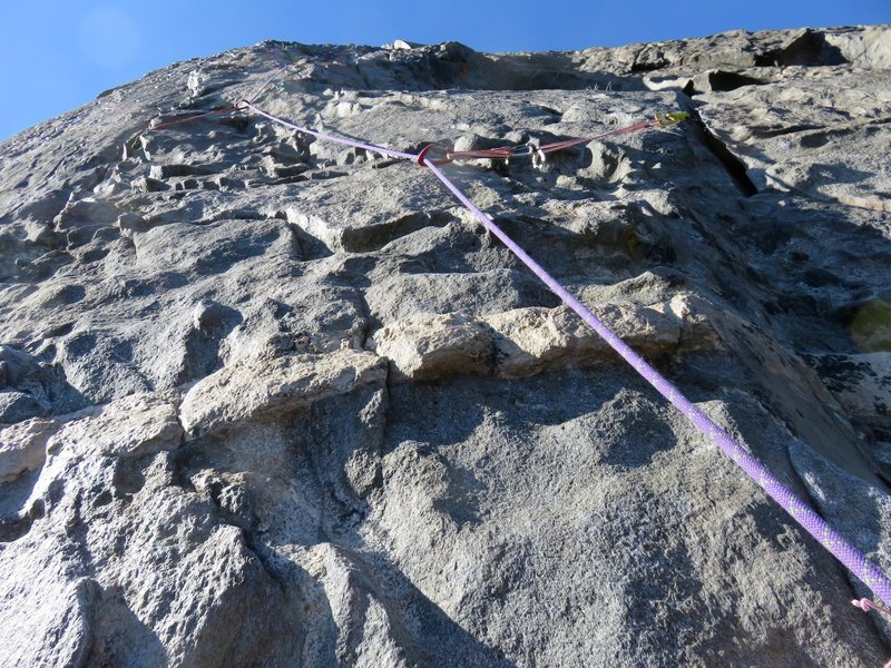 Pitch 11. Steep slightly-runout 5.8 knobby face climbing. The topo notes this as the mental crux of the route.