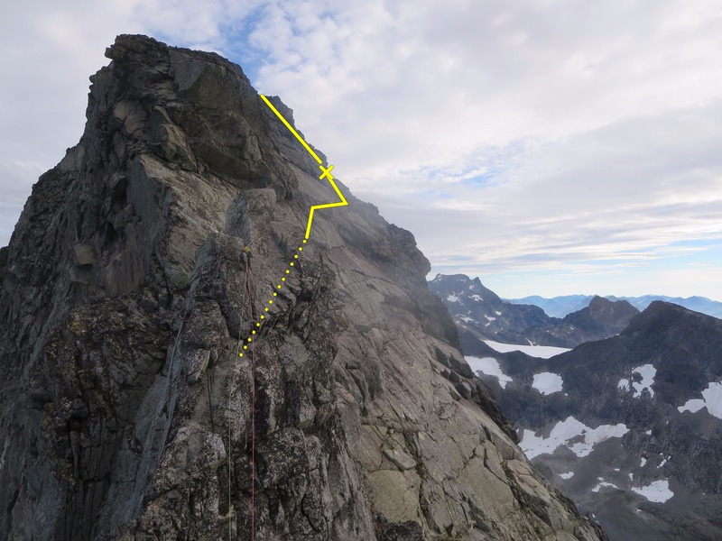 Climbing up to the pinnacle before Søre. Follow the line for best/easiest ascent on other side.
