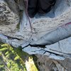 Pitch 10. Looking down from midway up the pitch. The rock on this pitch is different than the rest of the route—more white and rounded and granular, with soft cracks and rounded jugs and good friction.