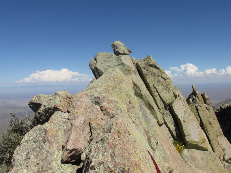 Summit of Lost Peak. Sling for the rappel to the south shown near the bottom.