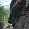 Leading Steppenruf. A fun but short route that goes over the two roofs in the picture and up the short slab above. 