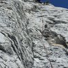 Carl at the crux of the second pitch. Continues technical climbing once you leave the belay stance. 