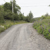 Road to parking area and trail head behind the UC cemetery. Swift Current, Newfoundland. 21km from Trans Canada Highway turn off at Goobies. 