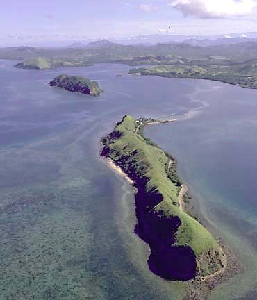 Loloata Island is the long island in the foreground.  Lion island is the smaller island just behind.