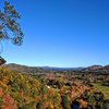 And this is the super spectacular view from the top of the 2nd pitch at peak fall foliage.   I say the lone tree can compete with Predator as the profile of Rumney