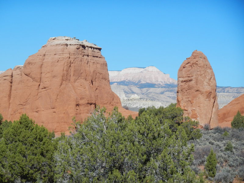 Gun-Sight Butte left, Powell Point center, and Entrada Tower right.