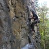 Easy climbing down low, send someone with a camera up to the ledge on climbers left.