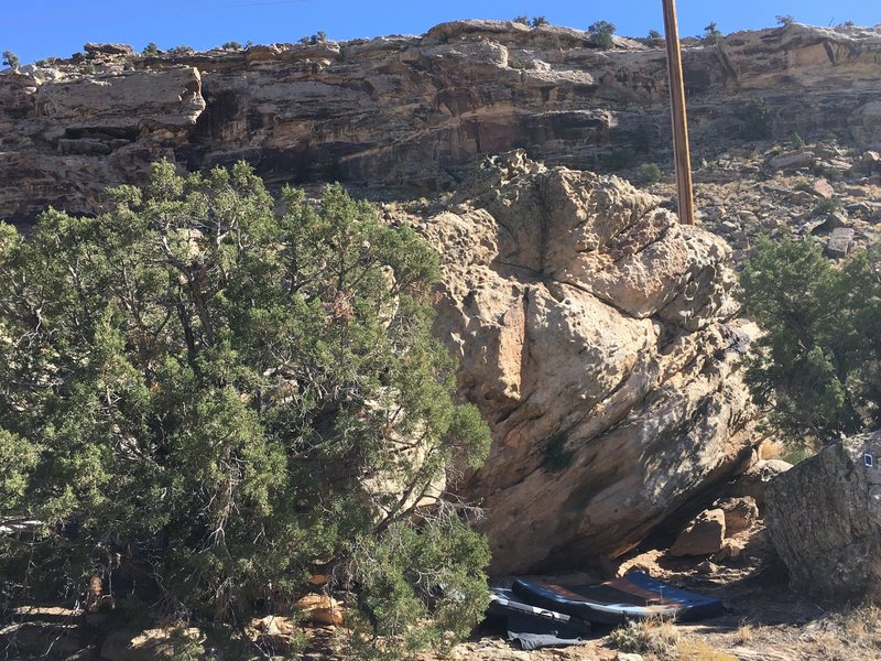 The main face of the boulder. The telephone pole helps create some context. 